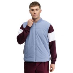 Męska ocieplana kamizelka golfowa Siroko Wedge Blue. Niebieskie buty sportowe męskie SIROKO, bez zapięcia, na golfa. Za 254.00 zł.