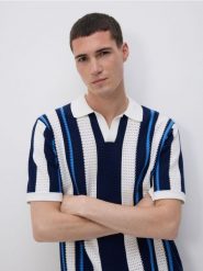 Ażurowy sweter polo - wielobarwny. Swetry przez głowę męskie Reserved, l, w ażurowe wzory, z bawełny, bez kołnierzyka. Za 139.99 zł.