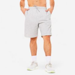 Spodenki fitness męskie Domyos. Niebieskie krótkie spodenki sportowe męskie DOMYOS, l, bez wzorów, z bawełny, na fitness i siłownię. Za 69.99 zł.