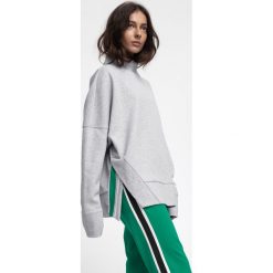 Bluza damska BLD220 - chłodny jasny szary melanż. Bluzy damskie marki KALENJI. W wyprzedaży za 79.99 zł.