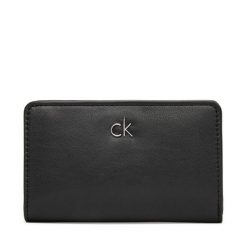 Portfel Calvin Klein. Czarne portfele damskie Calvin Klein, bez wzorów. Za 159.99 zł.
