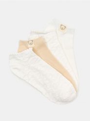 Bawełniane stopki 4 pack - kremowy. Białe skarpety damskie Sinsay, bez wzorów, z bawełny. Za 12.99 zł.