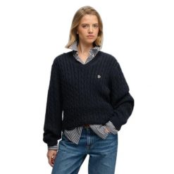 Damski oversize sweter z dekoltem w kształcie V Superdry. Niebieskie swetry damskie Superdry., na zimę, bez wzorów, eleganckie, bez kołnierzyka, bez ramiączek, bez kaptura. Za 284.00 zł.