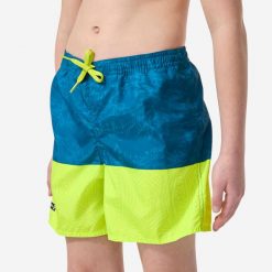 Spodenki surfingowe dla dzieci Olaian 100 Stories. Żółte szorty dla chłopców OLAIAN, bez wzorów, z materiału, sportowe. Za 39.99 zł.