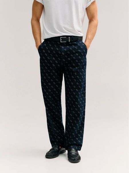 Guess Jeansy Damon M6YAV7 D1290 Granatowy Relaxed Fit. Niebieskie jeansy męskie Guess. Za 497.99 zł.