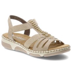 Sandały damskie Rieker, cholewka ze skóry naturalnej i materiału tekstylnego paski dla lepszego dopasowania, beżowe, 66201-62. Brązowe klapki damskie Rieker, bez wzorów, ze skóry, bez obcasa, na koturnie, bez zapięcia. Za 319.00 zł.