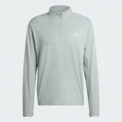 Bluza adi365 Iconic 1/2 Zip. Zielone bluzy męskie Adidas, xl, bez wzorów, z dzianiny, bez kaptura. Za 219.00 zł.