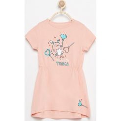 Sukienka z uroczym nadrukiem - Pomarańczo. Sukienki niemowlęce Reserved, z nadrukiem. W wyprzedaży za 14.99 zł.