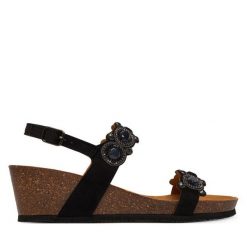 Sandały Scholl. Czarne sandały damskie Scholl, bez wzorów, bez obcasa, na koturnie, bez zapięcia. Za 439.99 zł.