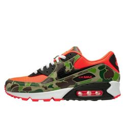 Buty do chodzenia dla dorosłych Air Max 90 Reverse Duck Camo. Zielone obuwie sportowe damskie Nike, bez wzorów, z materiału, trekkingowe, nike air max. Za 1,267.95 zł.