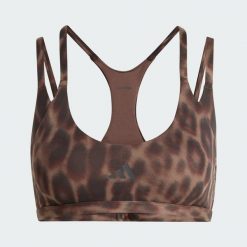 Biustonosz Optime Leopard Strappy Light Support. Brązowe obuwie sportowe damskie Adidas, bez wzorów, na fitness i siłownię. Za 239.00 zł.