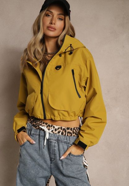 Żółta Kurtka w Stylu Oversize z Kapturem i Kieszeniami Lorlio. Żółte kurtki damskie Renee, l, bez wzorów, z kapturem. Za 169.99 zł.