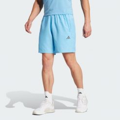 Spodenki krótkie treningowe męskie adidas Essentials. Czarne buty sportowe męskie Adidas, m, bez wzorów, z materiału, na fitness i siłownię. Za 93.99 zł.