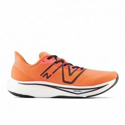 Obuwie do Biegania dla Dorosłych New Balance FuelCell Rebel Pomarańczowy. Brązowe buty sportowe męskie New Balance, z gumy, bez zapięcia, do biegania. Za 501.00 zł.