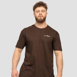 Koszulka męska fitness regular z krótkim rękawem brązowa Basic. Brązowe koszulki sportowe męskie GYMBEAM, m, bez wzorów, z bawełny, bez kołnierzyka, bez ramiączek, na fitness i siłownię. Za 42.90 zł.