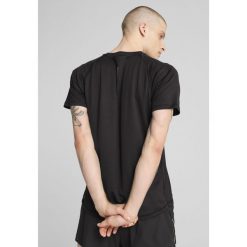 Męska koszulka do biegania VELOCITY PUMA Black. Czarne koszulki sportowe męskie Puma, m, bez wzorów, bez kołnierzyka, bez ramiączek, do biegania. Za 129.00 zł.