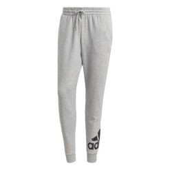 Spodnie dla dorosłych Adidas Essentials French Terry Szary. Czarne spodnie sportowe męskie Adidas, m, bez wzorów, z bawełny, na fitness i siłownię. Za 239.35 zł.