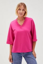 Bluza oversize z dekoltem w serek fuksjowa. Bluzy damskie MOODO, l, bez wzorów, z bawełny, bez kaptura. Za 79.99 zł.