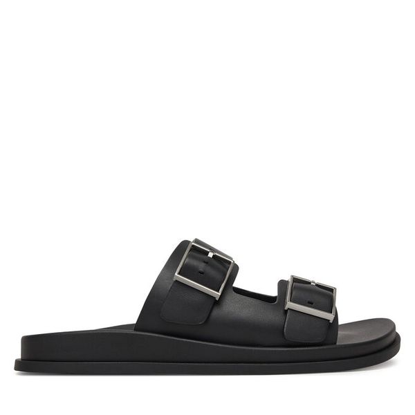 Klapki Calvin Klein. Czarne klapki damskie Calvin Klein, bez wzorów, bez obcasa. Za 301.99 zł.
