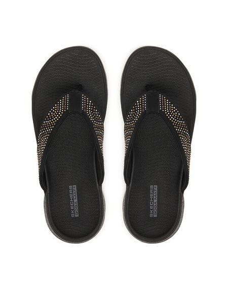 Skechers Japonki 140184/BBK Czarny. Czarne klapki damskie Skechers, bez wzorów, z materiału, bez obcasa. Za 199.99 zł.