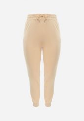 Beżowe Spodnie Dresowe Joggery z Wsuwanymi Kieszeniami Davidora. Brązowe spodnie dresowe damskie Born2be, xl, bez wzorów, z dresówki. Za 24.99 zł.