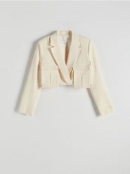 Krótka marynarka z dodatkiem lnu - kremowy. Białe żakiety damskie Reserved, l, bez wzorów, z tkaniny. W wyprzedaży za 99.99 zł.