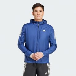Kurtka Own The Run. Niebieskie kurtki męskie Adidas, bez wzorów, do biegania. Za 379.00 zł.