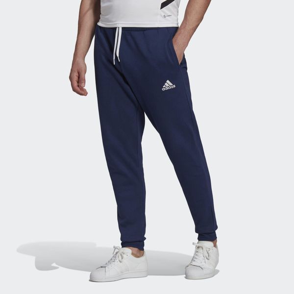 Spodnmie do piłki nożnej męskie Adidas Entrada 22 Sweat Pants. Niebieskie spodnie sportowe męskie Adidas, m, bez wzorów, z dresówki, do piłki nożnej. Za 130.99 zł.