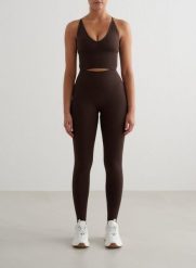 Damskie legginsy bezszwowe, wysoki stan, squat proof petite Shape czekoladowy. Brązowe legginsy damskie Aim'n, xs, bez wzorów, z elastanu. Za 296.00 zł.