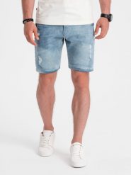 Jeansowe krótkie spodenki męskie z dziurami – jasnoniebieskie V1. Niebieskie spodnie materiałowe męskie Ombre Clothing, m, z aplikacjami, z bawełny, klasyczne. W wyprzedaży za 39.99 zł.