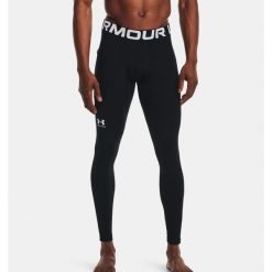 Legginsy termoaktywne męskie UNDER ARMOUR szybkoschnące termiczne. Czarne legginsy sportowe męskie Under Armour, m, bez wzorów, do piłki nożnej. W wyprzedaży za 197.05 zł.