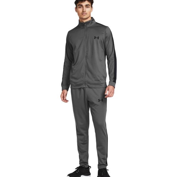 Dres męski Under Armour Rival Knit Track Suit. Szare buty sportowe męskie Under Armour, z dresówki, bez zapięcia, na fitness i siłownię. Za 269.99 zł.