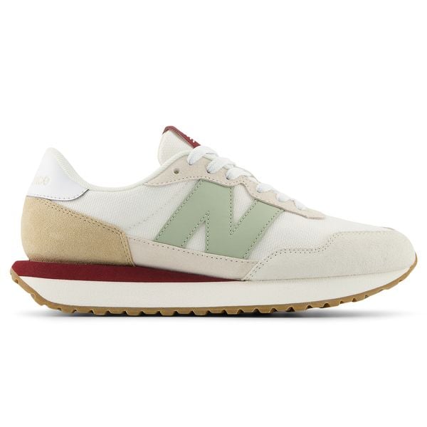 Buty damskie New Balance WS237GM – beżowe. Brązowe obuwie sportowe damskie New Balance, bez wzorów, z gumy. Za 299.99 zł.