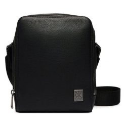 Saszetka Calvin Klein. Czarne saszetki męskie Calvin Klein, młodzieżowe, małe. Za 369.99 zł.