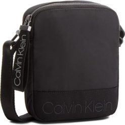 Saszetka CALVIN KLEIN - Shadow Mini Reporter K50K503904 001. Saszetki męskie marki Calvin Klein. Za 279.00 zł.