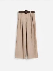 Luźne spodnie z paskiem - beżowy. Brązowe spodnie materiałowe damskie Reserved, bez wzorów, z lyocellu. Za 139.99 zł.