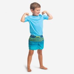 Spodenki Surfing Bs 100 Tokyo Sun Dla Dzieci. Niebieskie kąpielówki dla chłopców OLAIAN, bez wzorów, z materiału. Za 29.99 zł.