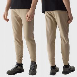 SPODNIE DRESOWE MĘSKIE 4F JOGGERY DRESY SPORTOWE TTROM603 3XL. Brązowe spodnie sportowe męskie 4f, m, bez wzorów, z bawełny, na fitness i siłownię. Za 149.99 zł.