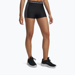 Spodenki Under Armour HeatGear Rib Shorty. Czarne obuwie sportowe damskie Under Armour, bez wzorów, na fitness i siłownię. Za 119.99 zł.