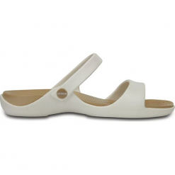 Klapki "Cleo" w kolorze biało-złotym. Białe klapki damskie Crocs. W wyprzedaży za 68.95 zł.