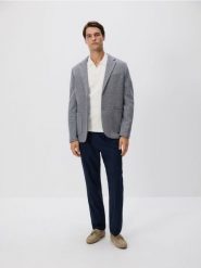 Dzianinowa marynarka slim fit - granatowy. Niebieskie marynarki męskie Reserved, bez wzorów, z bawełny. W wyprzedaży za 119.99 zł.