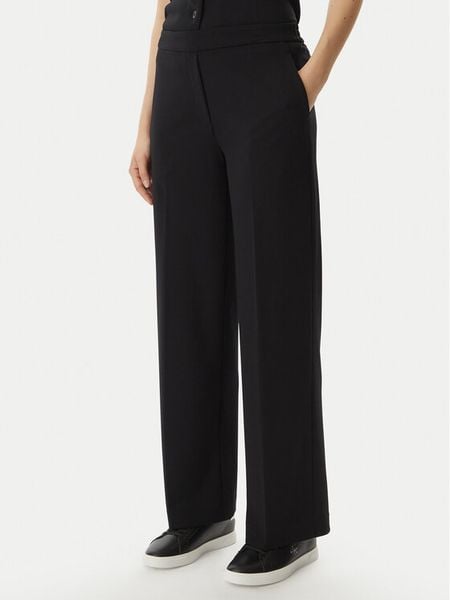Calvin Klein Spodnie materiałowe LV044F648G Czarny Wide Leg. Czarne spodnie materiałowe damskie Calvin Klein, bez wzorów, z materiału. Za 449.99 zł.