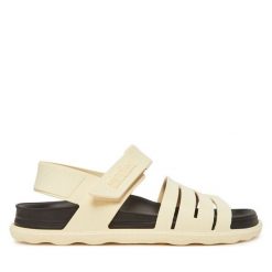 Sandały Melissa. Brązowe sandały damskie Melissa, bez wzorów, bez obcasa, na płaskiej podeszwie, bez zapięcia. Za 299.99 zł.
