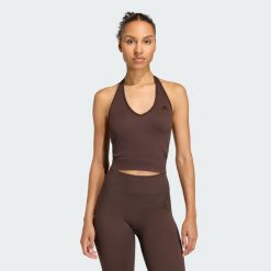 Koszulka Workout Essentials Knit Halterneck. Brązowe koszulki sportowe damskie Adidas, bez wzorów, z dzianiny, na fitness i siłownię. Za 179.00 zł.