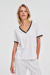 Bluzka z bawełny biała. Białe bluzki damskie MOODO, l, bez wzorów, z bawełny, bez kołnierzyka, bez ramiączek. Za 54.99 zł.