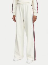 Tommy Hilfiger Spodnie dresowe UW0UW06628 Kremowy Wide Leg. Białe spodnie dresowe damskie Tommy Hilfiger, xs, bez wzorów, z bawełny. Za 329.99 zł.