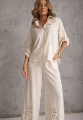 Beżowy Boho Komplet z Bawełną Koszula i Spodnie z Ażurowymi Zdobieniami Runesa. Brązowe koszule damskie Renee, m, z aplikacjami, z bawełny, boho, bez kołnierzyka, bez ramiączek. Za 149.99 zł.