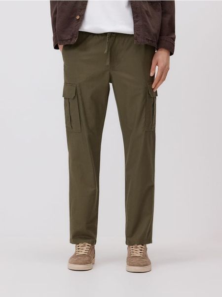 Spodnie jogger z lnem - zielony. Zielone spodnie materiałowe męskie Reserved, l, bez wzorów, z bawełny. Za 149.99 zł.
