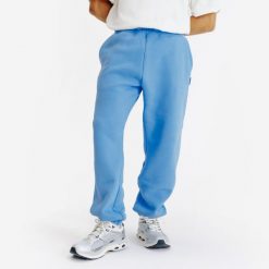 Spodnie męskie Elementals. Niebieskie spodnie materiałowe męskie Decathlon, l, bez wzorów, z bawełny. Za 159.99 zł.