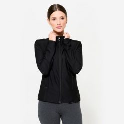 Bluza na zamek damska Domyos fitness. Czarne bluzy sportowe damskie DOMYOS, l, bez wzorów, z elastanu, bez kaptura, na fitness i siłownię. Za 89.99 zł.